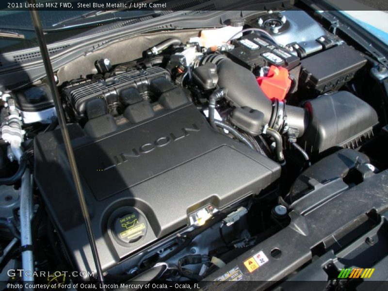 Steel Blue Metallic / Light Camel 2011 Lincoln MKZ FWD