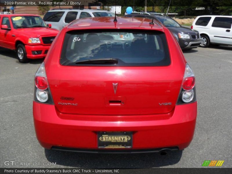 Red Hot Metallic / Ebony 2009 Pontiac Vibe