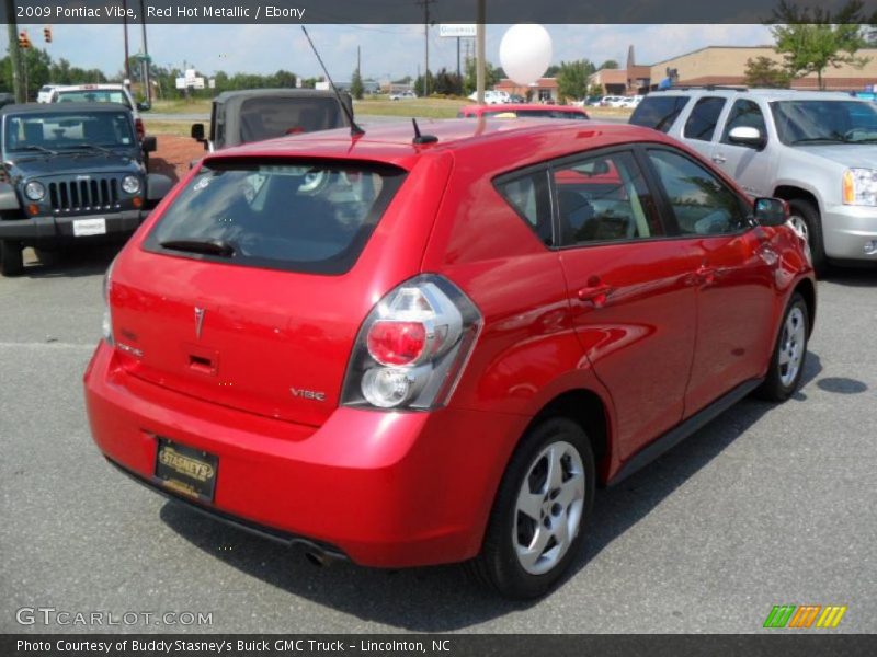 Red Hot Metallic / Ebony 2009 Pontiac Vibe