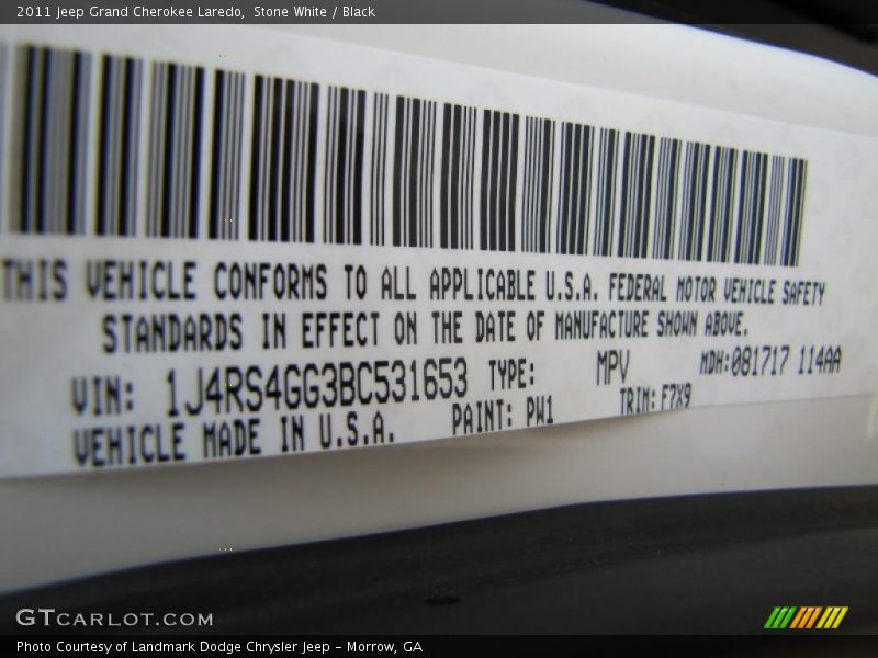 Stone White / Black 2011 Jeep Grand Cherokee Laredo