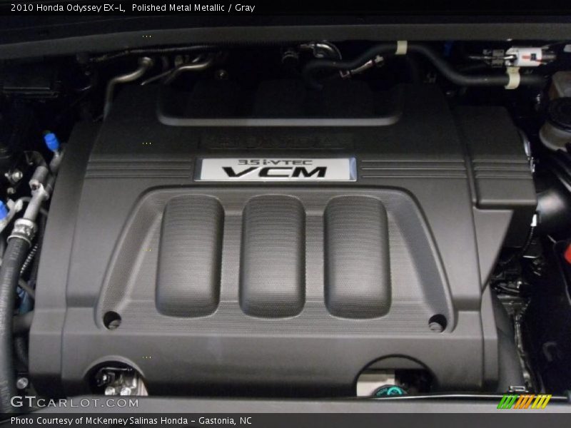 Polished Metal Metallic / Gray 2010 Honda Odyssey EX-L