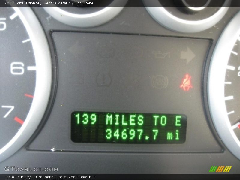 Redfire Metallic / Light Stone 2007 Ford Fusion SE