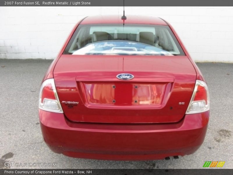 Redfire Metallic / Light Stone 2007 Ford Fusion SE