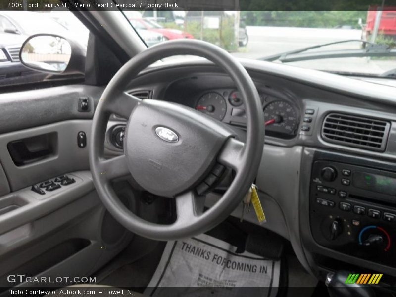 Merlot Pearl Clearcoat / Ebony Black 2005 Ford Taurus SE