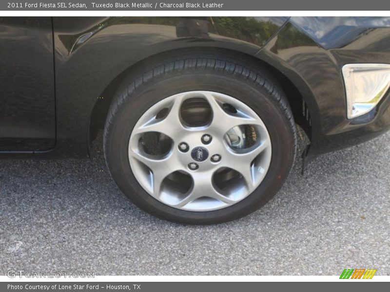Tuxedo Black Metallic / Charcoal Black Leather 2011 Ford Fiesta SEL Sedan