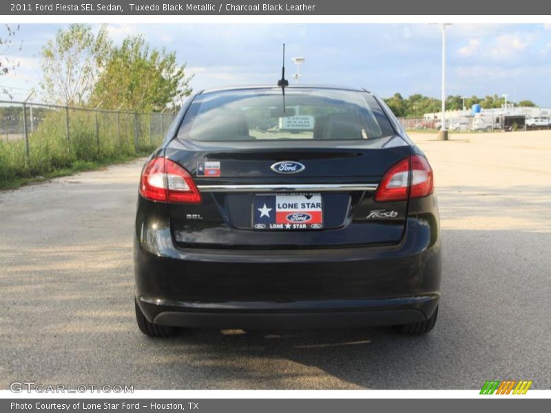 Tuxedo Black Metallic / Charcoal Black Leather 2011 Ford Fiesta SEL Sedan