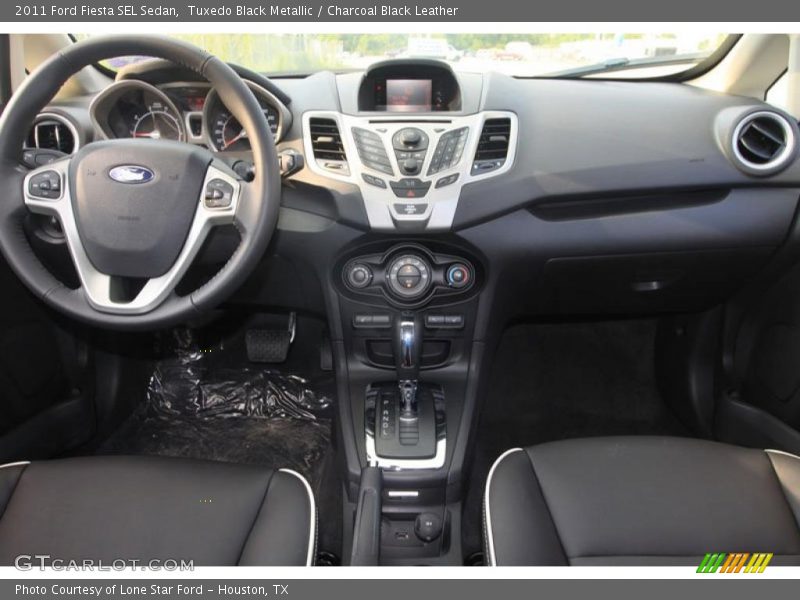 Tuxedo Black Metallic / Charcoal Black Leather 2011 Ford Fiesta SEL Sedan
