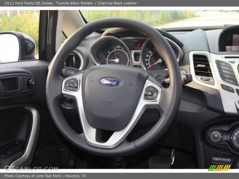 Tuxedo Black Metallic / Charcoal Black Leather 2011 Ford Fiesta SEL Sedan