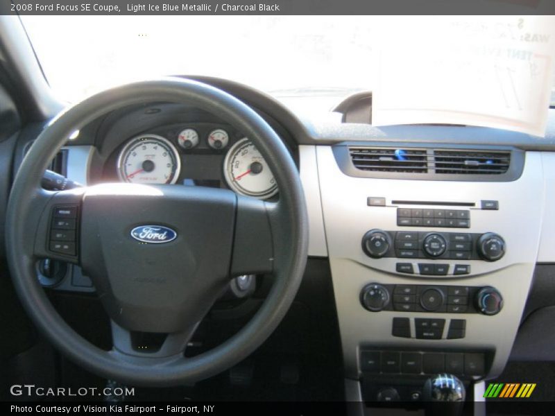 Light Ice Blue Metallic / Charcoal Black 2008 Ford Focus SE Coupe
