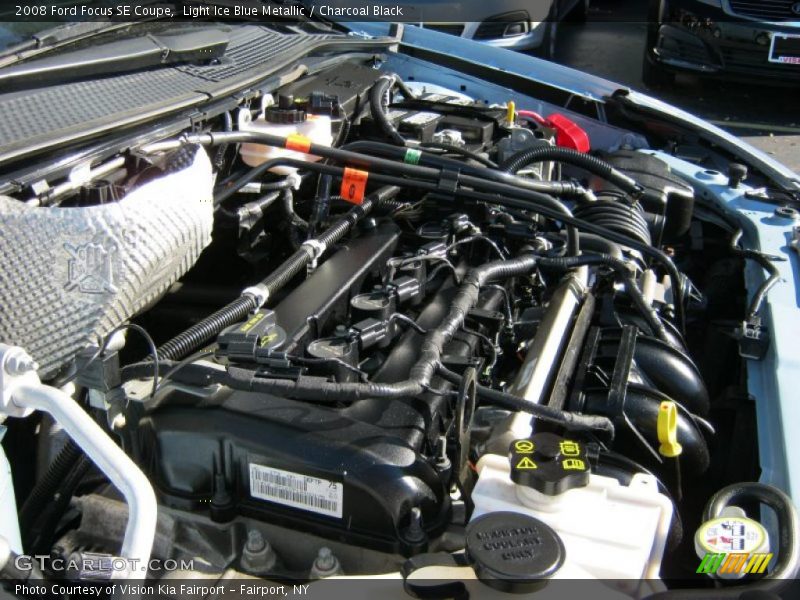 Light Ice Blue Metallic / Charcoal Black 2008 Ford Focus SE Coupe