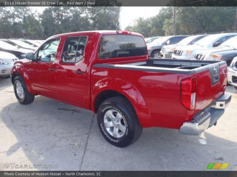 Red Alert / Steel 2010 Nissan Frontier SE Crew Cab