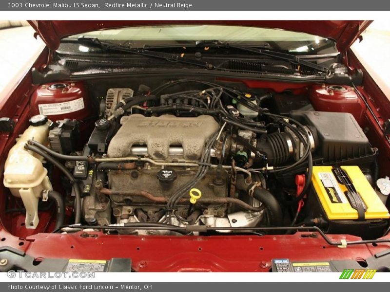 Redfire Metallic / Neutral Beige 2003 Chevrolet Malibu LS Sedan
