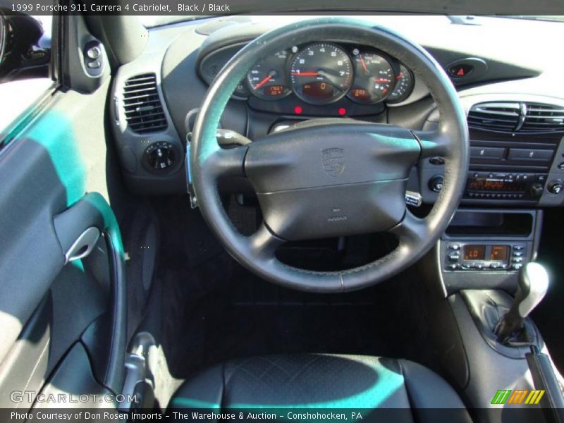Black / Black 1999 Porsche 911 Carrera 4 Cabriolet