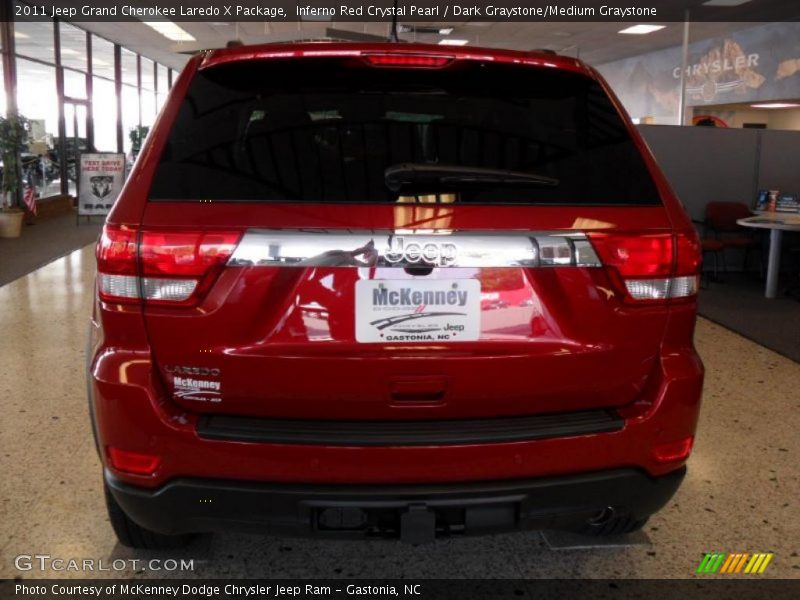 Inferno Red Crystal Pearl / Dark Graystone/Medium Graystone 2011 Jeep Grand Cherokee Laredo X Package