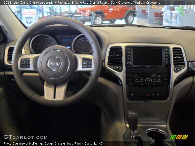 Inferno Red Crystal Pearl / Dark Graystone/Medium Graystone 2011 Jeep Grand Cherokee Laredo X Package