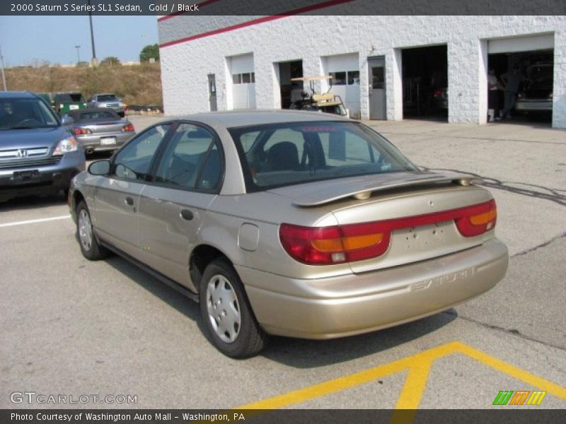 Gold / Black 2000 Saturn S Series SL1 Sedan