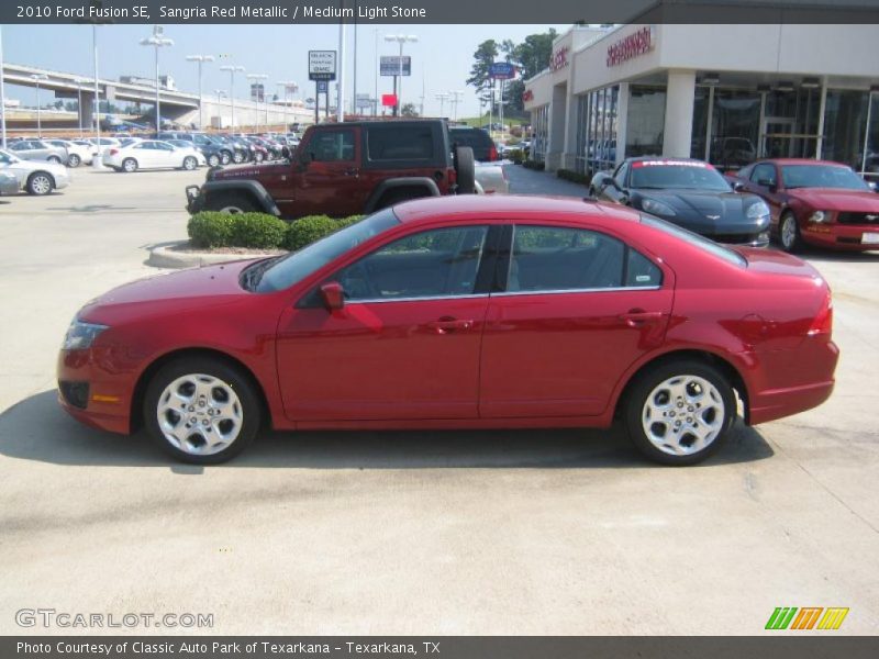 Sangria Red Metallic / Medium Light Stone 2010 Ford Fusion SE