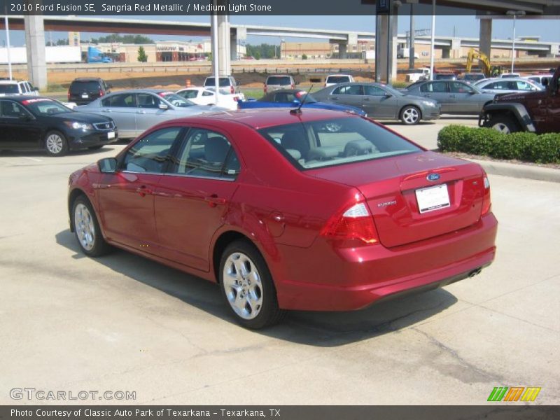 Sangria Red Metallic / Medium Light Stone 2010 Ford Fusion SE