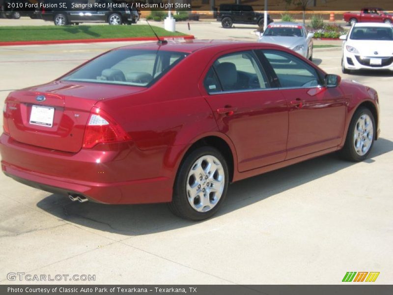 Sangria Red Metallic / Medium Light Stone 2010 Ford Fusion SE