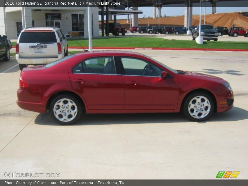 Sangria Red Metallic / Medium Light Stone 2010 Ford Fusion SE