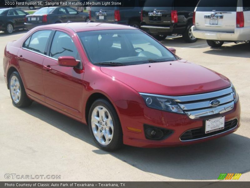 Sangria Red Metallic / Medium Light Stone 2010 Ford Fusion SE