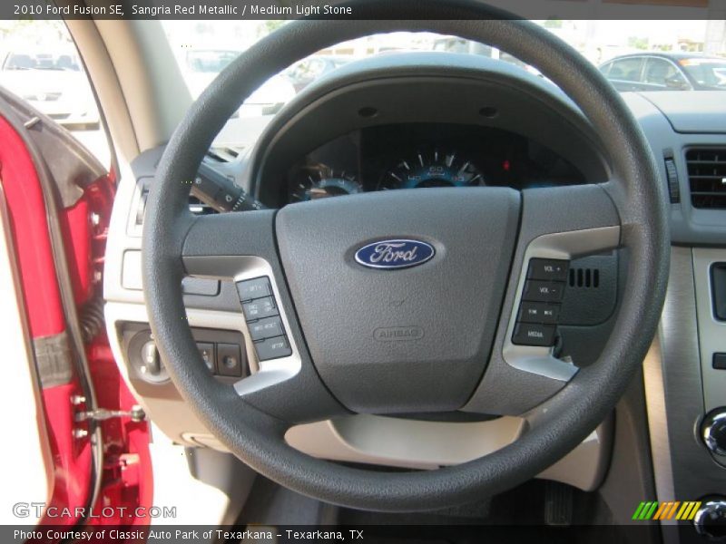 Sangria Red Metallic / Medium Light Stone 2010 Ford Fusion SE