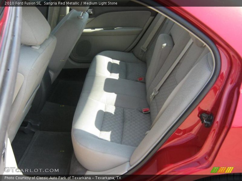 Sangria Red Metallic / Medium Light Stone 2010 Ford Fusion SE