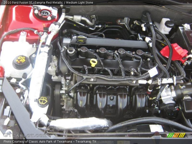 Sangria Red Metallic / Medium Light Stone 2010 Ford Fusion SE