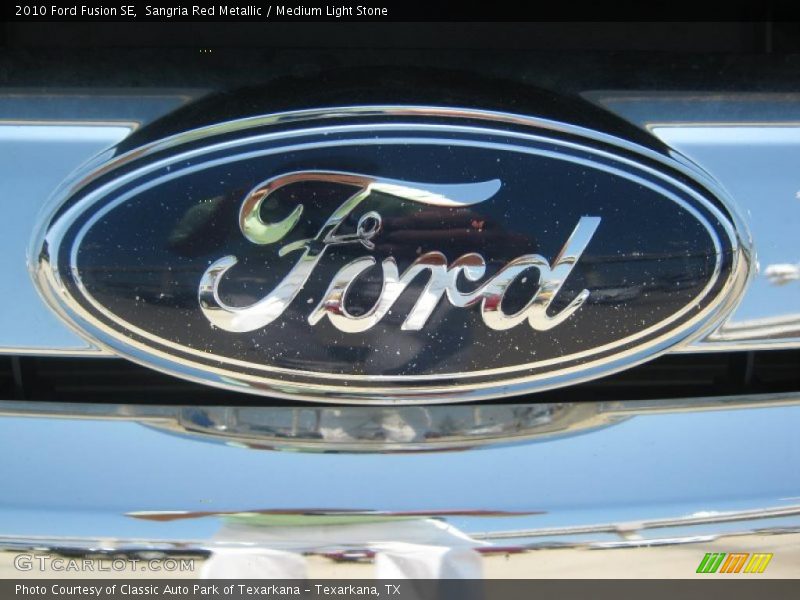 Sangria Red Metallic / Medium Light Stone 2010 Ford Fusion SE