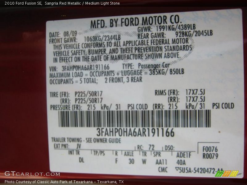 Sangria Red Metallic / Medium Light Stone 2010 Ford Fusion SE