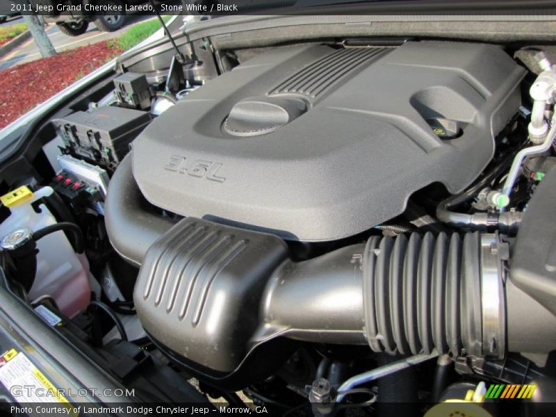 Stone White / Black 2011 Jeep Grand Cherokee Laredo