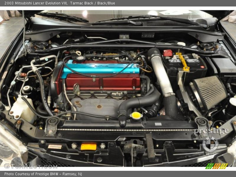 Tarmac Black / Black/Blue 2003 Mitsubishi Lancer Evolution VIII