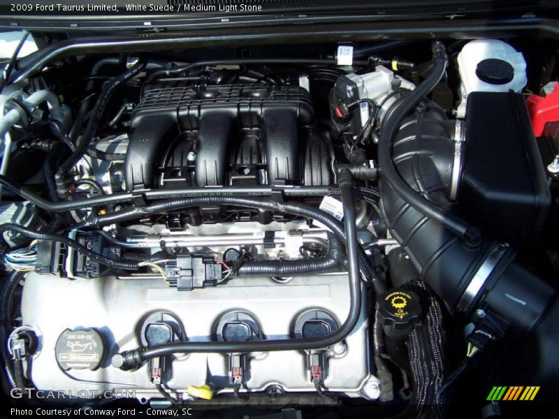 White Suede / Medium Light Stone 2009 Ford Taurus Limited