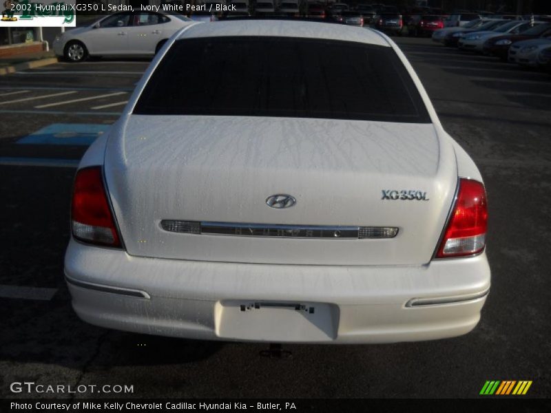 Ivory White Pearl / Black 2002 Hyundai XG350 L Sedan