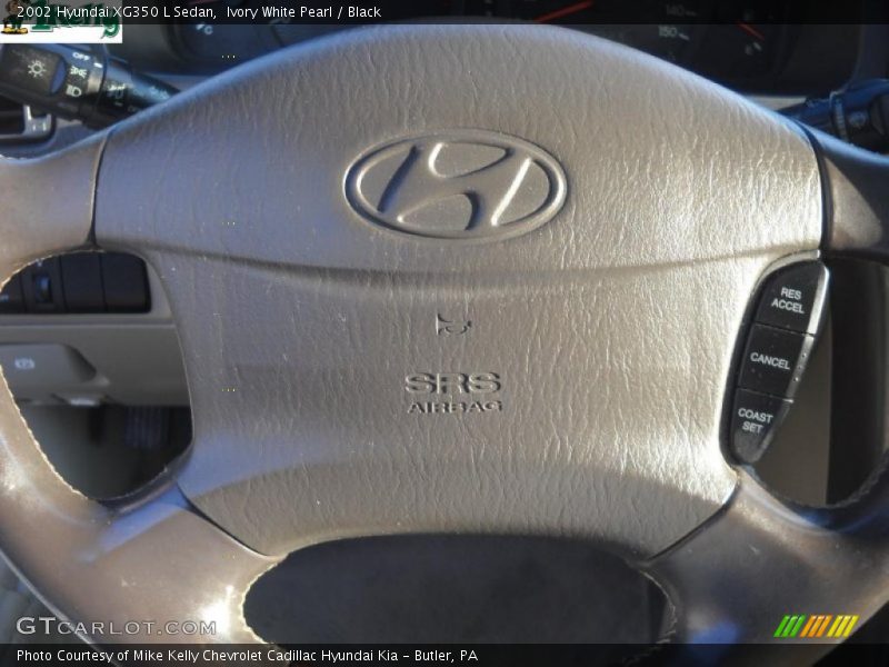 Ivory White Pearl / Black 2002 Hyundai XG350 L Sedan