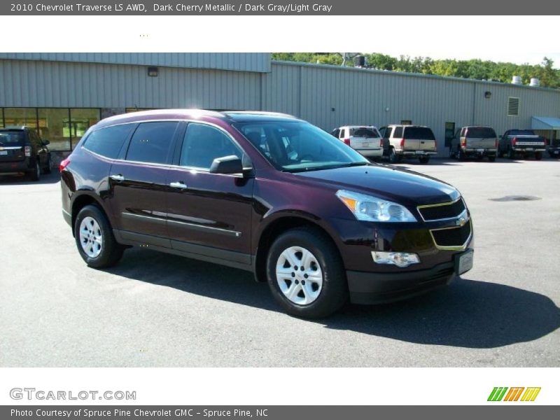 Dark Cherry Metallic / Dark Gray/Light Gray 2010 Chevrolet Traverse LS AWD
