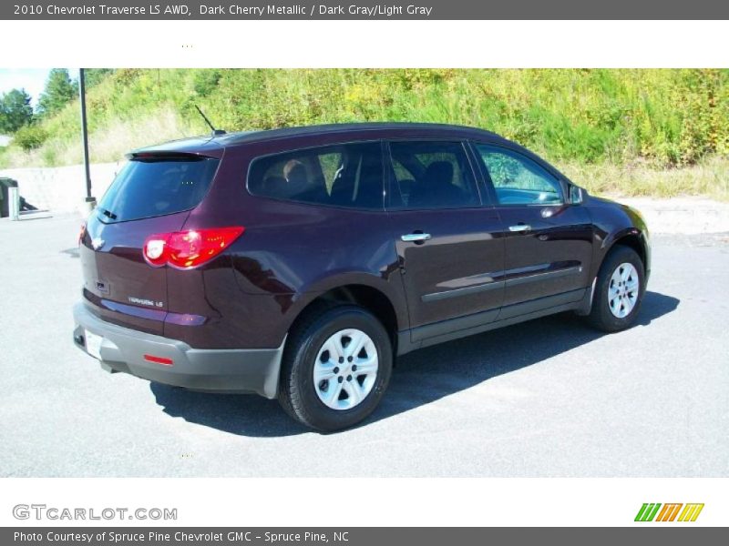 Dark Cherry Metallic / Dark Gray/Light Gray 2010 Chevrolet Traverse LS AWD