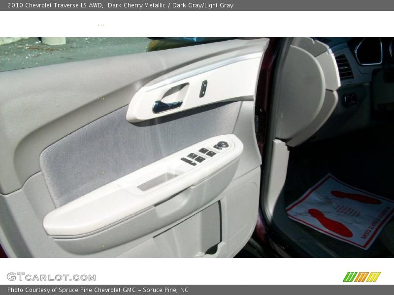 Dark Cherry Metallic / Dark Gray/Light Gray 2010 Chevrolet Traverse LS AWD