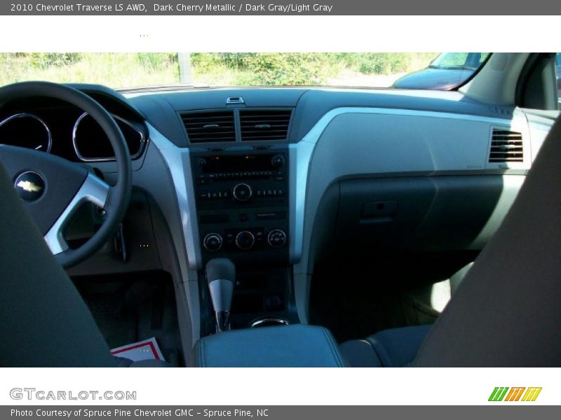 Dark Cherry Metallic / Dark Gray/Light Gray 2010 Chevrolet Traverse LS AWD