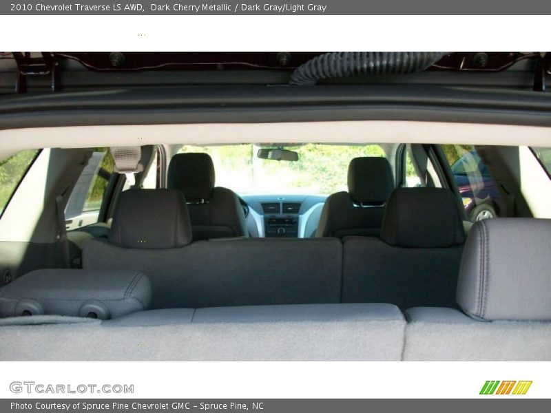 Dark Cherry Metallic / Dark Gray/Light Gray 2010 Chevrolet Traverse LS AWD