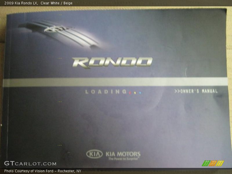Clear White / Beige 2009 Kia Rondo LX