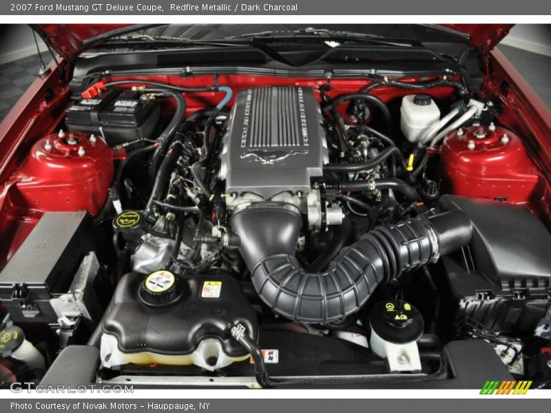 Redfire Metallic / Dark Charcoal 2007 Ford Mustang GT Deluxe Coupe