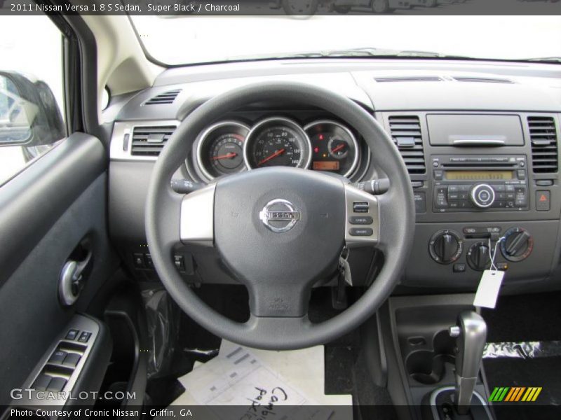 Super Black / Charcoal 2011 Nissan Versa 1.8 S Sedan