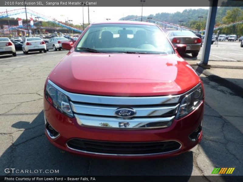 Sangria Red Metallic / Camel 2010 Ford Fusion SEL