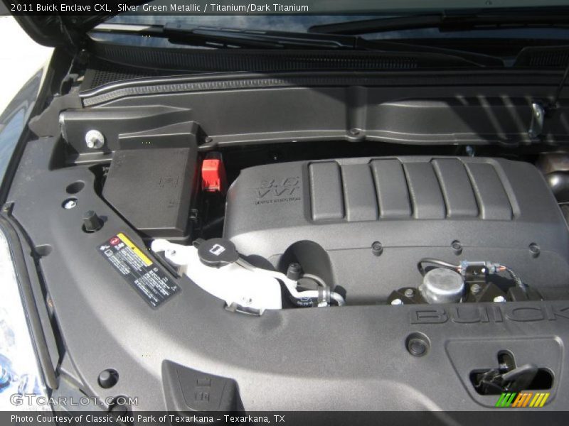 Silver Green Metallic / Titanium/Dark Titanium 2011 Buick Enclave CXL