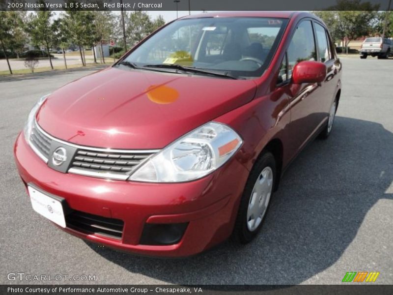 Red Brick / Charcoal 2009 Nissan Versa 1.8 S Sedan