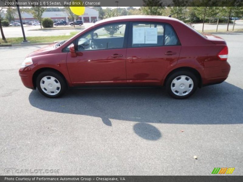Red Brick / Charcoal 2009 Nissan Versa 1.8 S Sedan