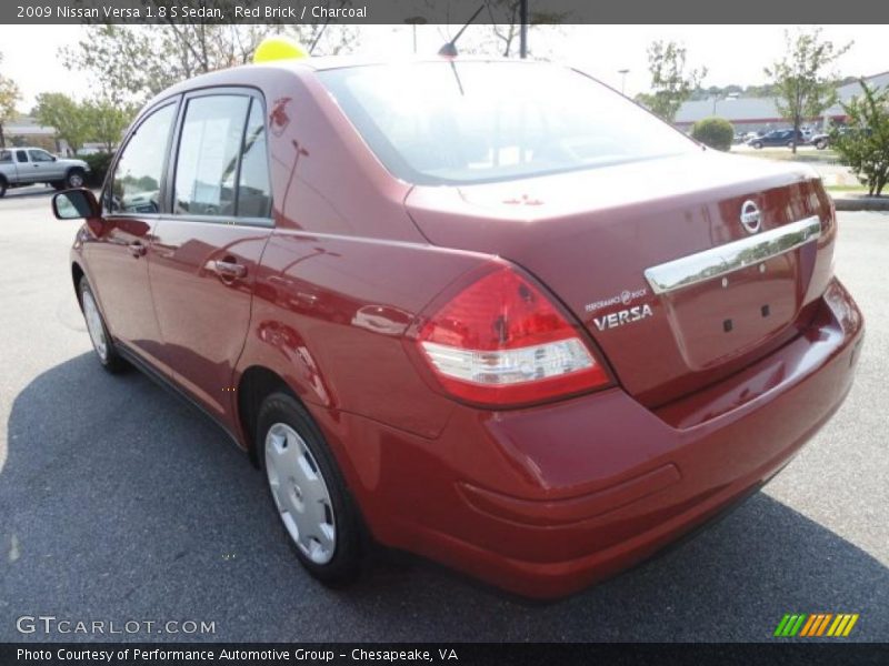 Red Brick / Charcoal 2009 Nissan Versa 1.8 S Sedan