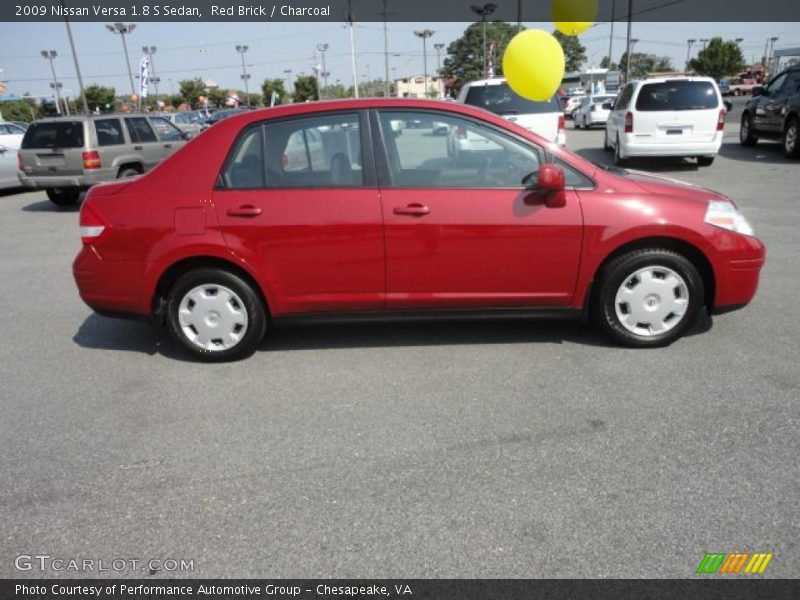 Red Brick / Charcoal 2009 Nissan Versa 1.8 S Sedan