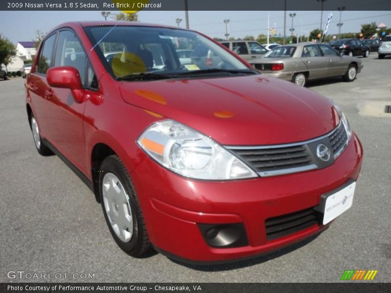Red Brick / Charcoal 2009 Nissan Versa 1.8 S Sedan